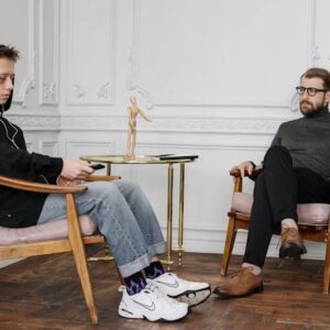 Photo by cottonbro studio: https://www.pexels.com/photo/man-in-black-sweater-and-blue-denim-jeans-sitting-on-brown-wooden-chair-4100638/